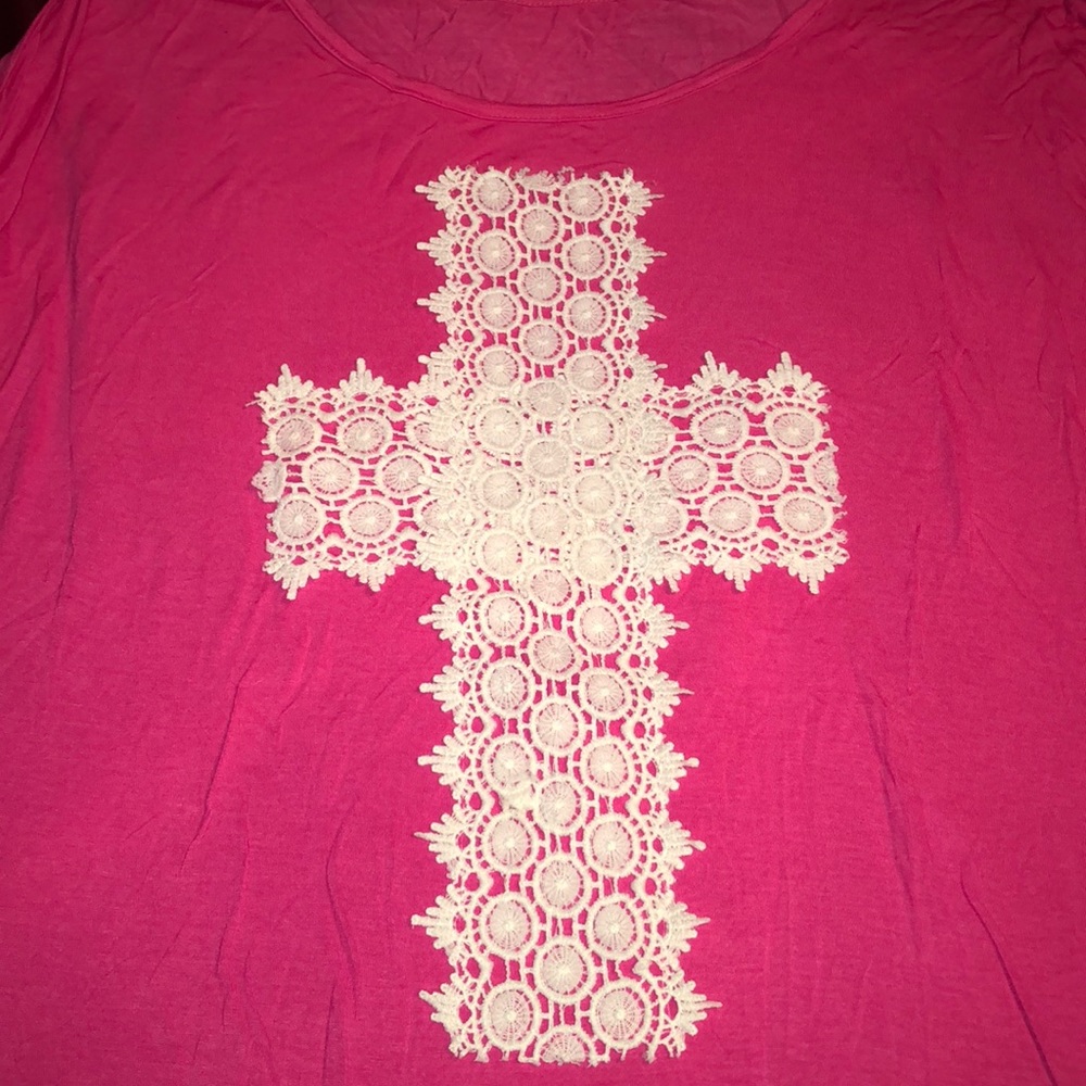 Pink T-shirt with lace cross attached